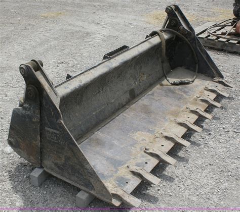 4 in 1 skid steer bucket cat|caterpillar attachments for skid steer.